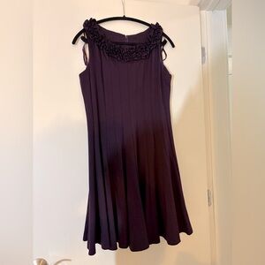 Jessica Howard. Deep purple pleated mid length sleeveless dress.